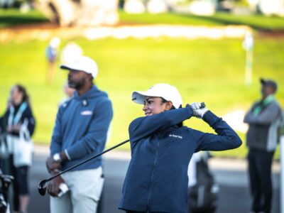 Girl golfing at Pure Insurance 2025